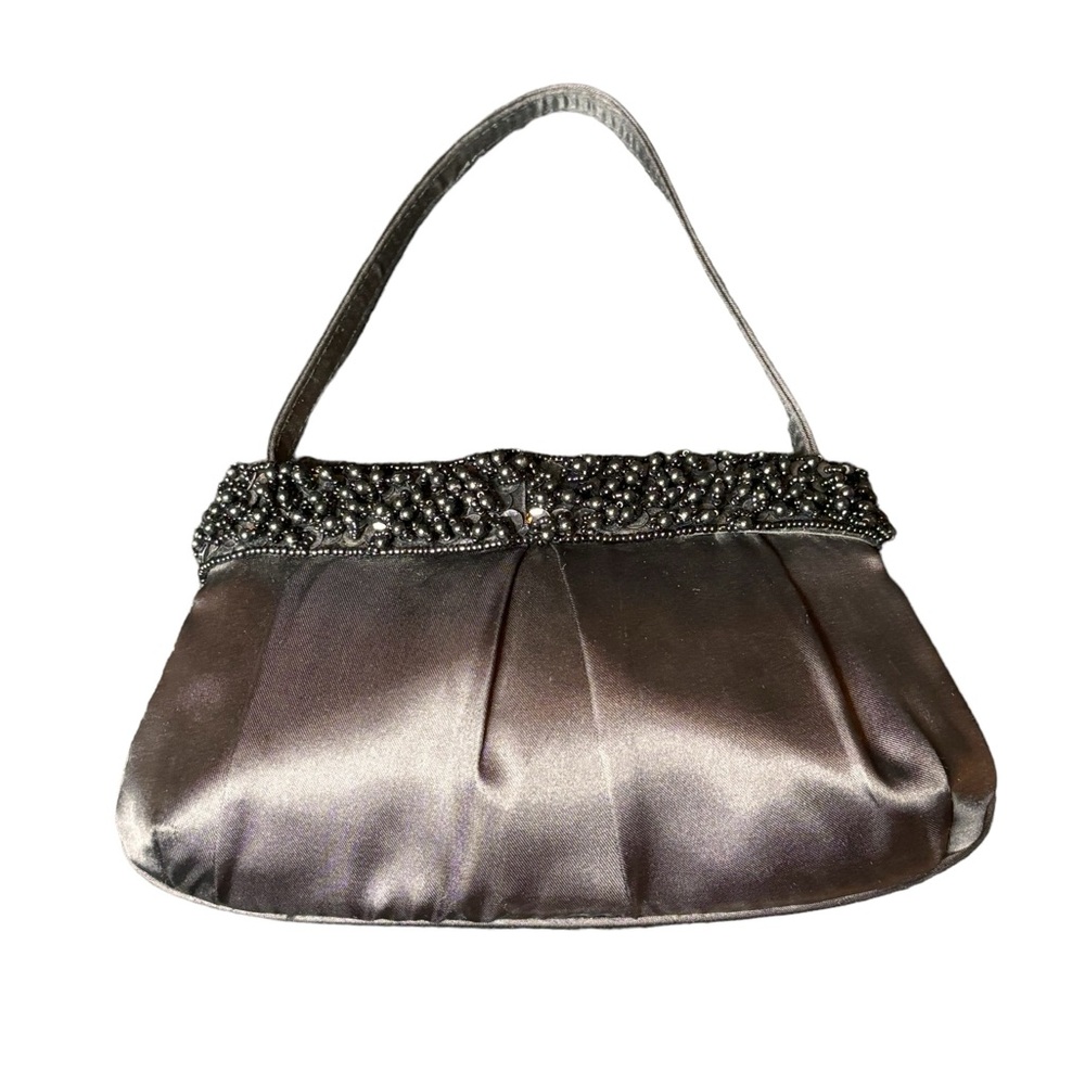 Small satin bag. In excellent used condition. Perfect for storing jewelry/displa